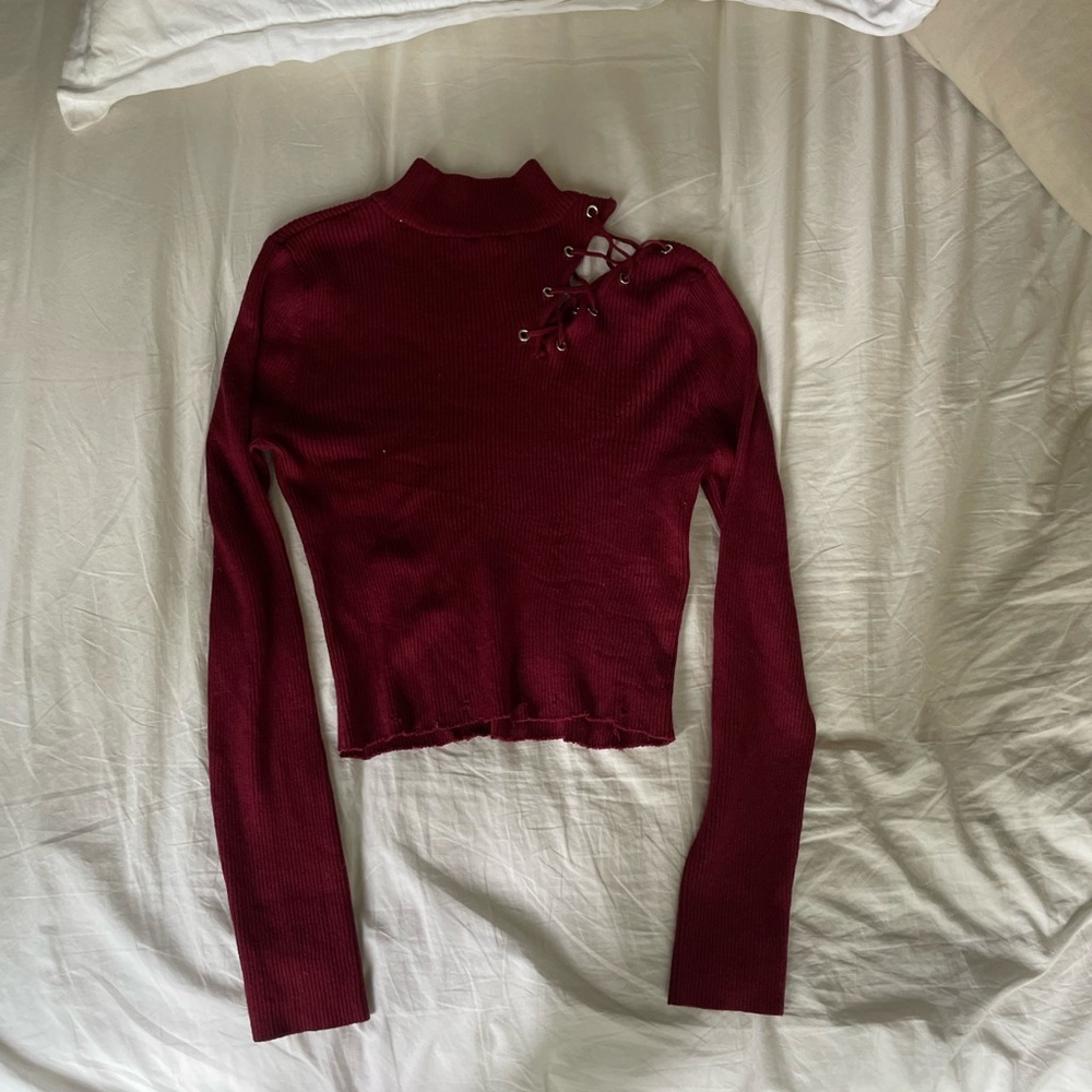 Red top with cut out shoulder/seam